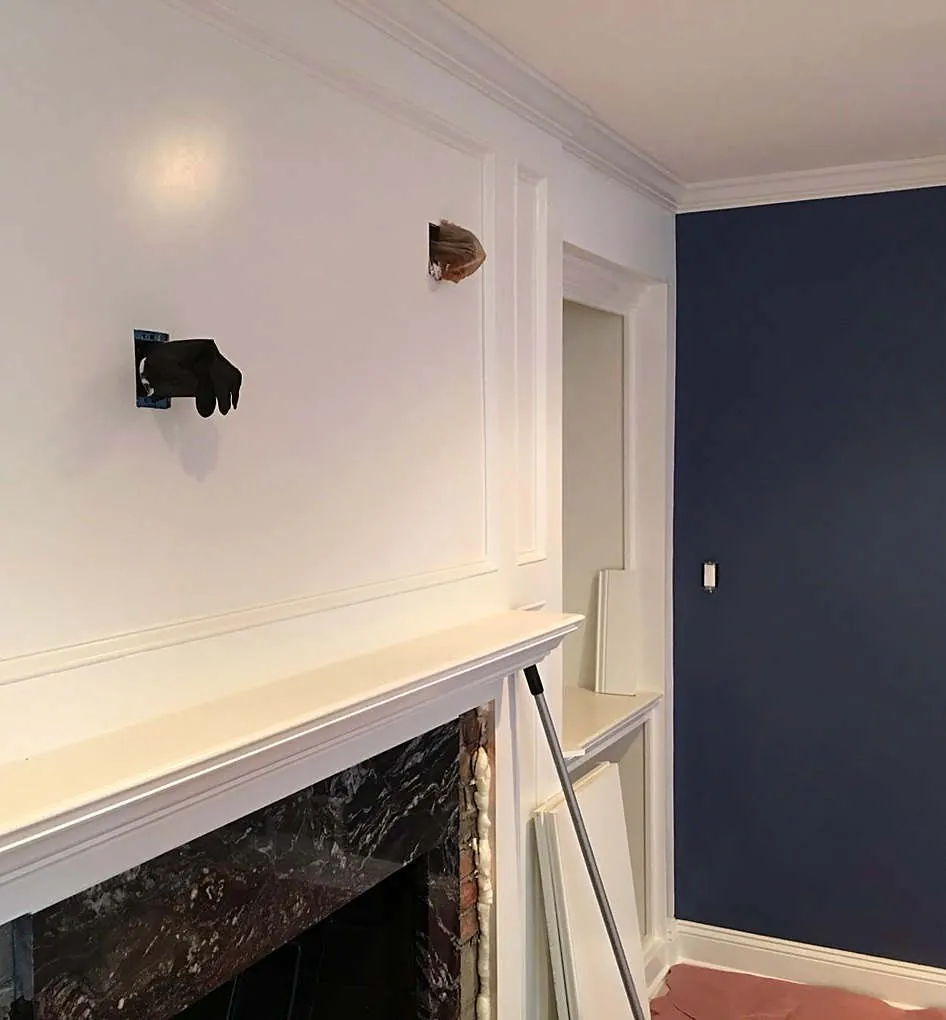 Navy wall and white millwork — Maximum Painting Solution project