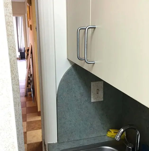 Cabinets, then the room around them — Refinished cabinet faces